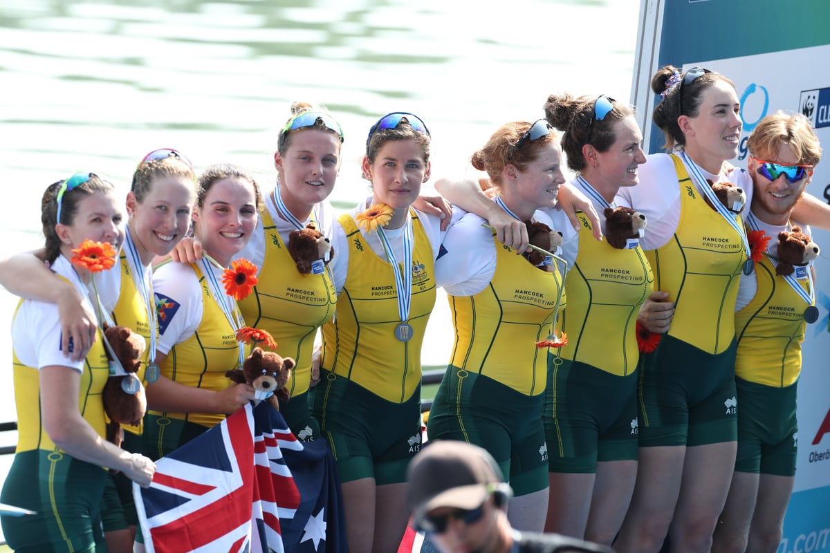 The Women_s Eight post receiving their medals - Copyright Rowing Australia